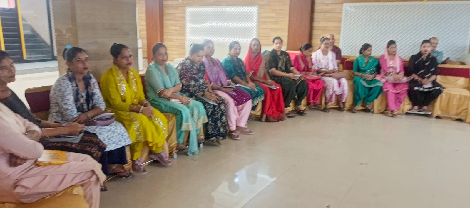 Caregivers participating in group learning during pre-service training