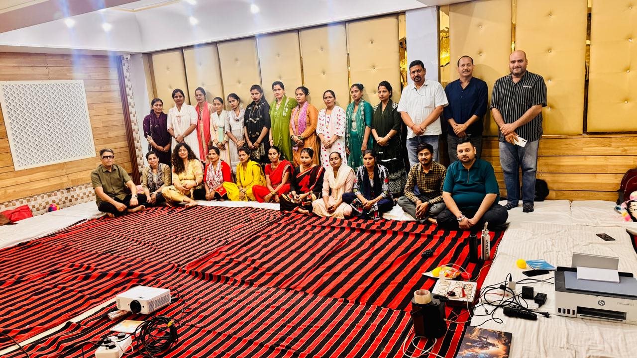 Caregivers and programme team at the pre-service training